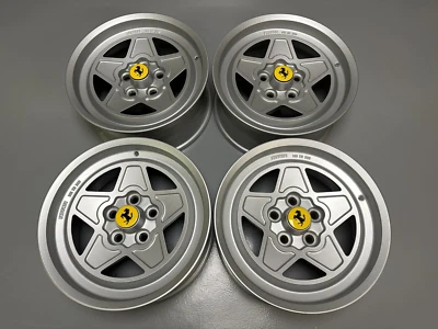 SET CERCHI IN LEGA ORIGINALI FERRARI 208 308 328 165TR390 117132 - Immagine 1 di 4