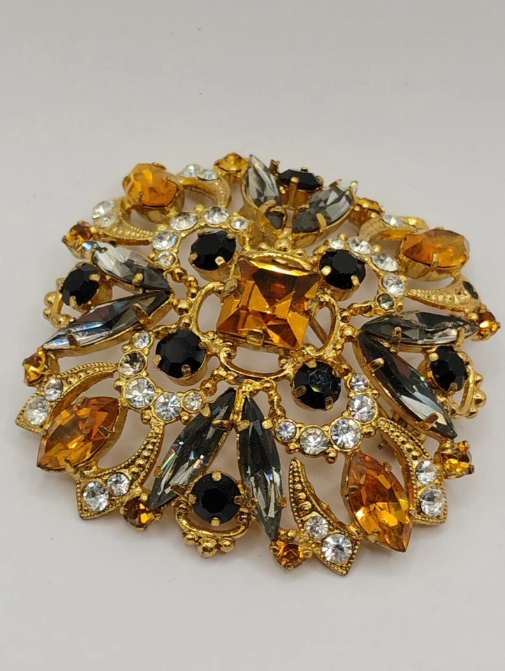 Broche prendedor vintage de cristal austriaco tono dorado con pedrería ámbar negro 2" Foto 1 de 4