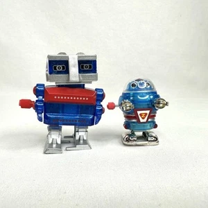2-Wind Up Twist Robots HANS 2K-4R Tomy 2008 Space Plastic Blue Silver Walking - Picture 1 of 12