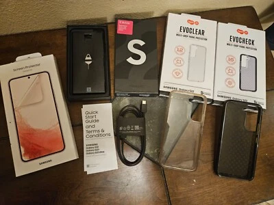 Samsung Galaxy S22 box and all accessories w/ Tech 21 cases and screen protector - Image 1 of 4