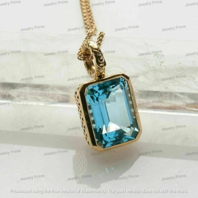 Colgante solitario aguamarina corte esmeralda de 4 quilates acabado oro amarillo de 14 quilates cadena gratis Foto 1 de 4
