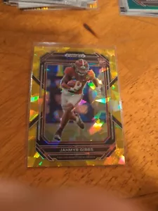 2023 Panini PRIZM ZUG PICKS JAHMYR GIBBS ROOKIE GOLD GEKNACKTE EISLÖWEN #116 - Bild 1 von 1