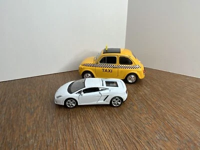 Modelo de coche diecast Welly escala 1/43 Fiat Nuova 500 amarillo cabina taxi Lamborghini Foto 1 de 4