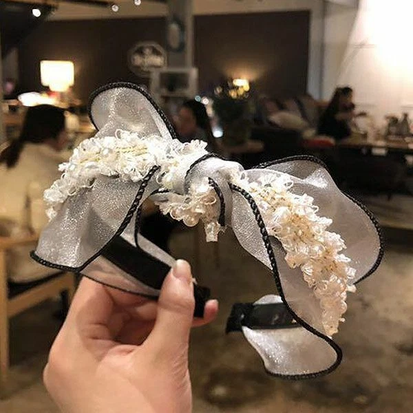 Faixa de cabeça elegante de alta moda com nós de renda com tecido de pérola acento-branco  - Imagem 1 de 2
