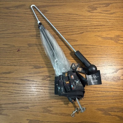 RARO Paraguas para perros por Nicole Miller Paraguas con correa para perro. Foto 1 de 4