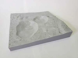 Modelo topográfico 3D de la NASA del cráter muñeco de nieve en el asteroide Vesta tomado en el D - Imagen 1 de 5