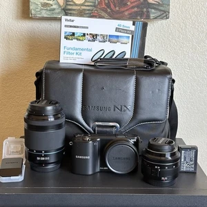 Samsung NX2000 fotocamera digitale mirrorless con obiettivi 20-50 mm e 50-200 mm kit - Foto 1 di 14
