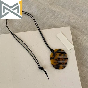 Korean Niche Leopard Print Vinegar Comb Black Rope Necklace Women Design Sweater - Bild 1 von 14