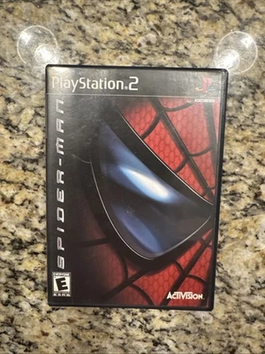 Spider-Man Sony (PlayStation 2, 2002), в комплекте с ручной черной этикеткой - Изображение 1 из 4