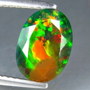 1.13 CT AMAZING MULTI-COLOR SPARKLING NATURAL SOLID BLACK OPAL FROM ETHIOPIA - Picture 1 of 3