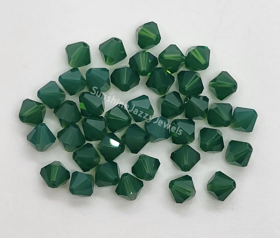 Swarovski Crystal Palace Green Opal Bicone Beads; 4mm (24)  or 6mm (12) - Image 1 of 1