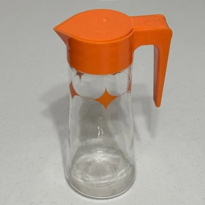 Jarra de jugo de vidrio vintage Anchor Hocking retro Atomic Tang naranja Starburst Foto 1 de 4