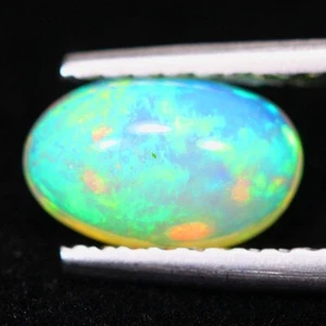 0.95 Ct Multi-Color Play (White) Opal Oval Shaped Cabochon Loose Gemstone - Picture 1 of 4