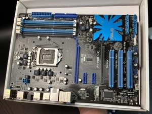 Carte mère socket ASUS P7P55 LX ATX LGA1156. Bouclier sans E/S en l'état - Photo 1/10