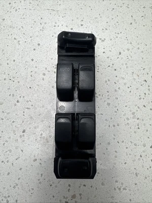 Interrupteur vitre avant gauche conducteur Chevrolet Tracker 2003 occasion B464-15 - Photo 1/4