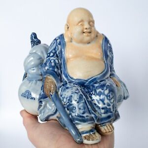 Antique Japanese Blue and White Porcelain Figurine of Seated Hotei Early 20th c.