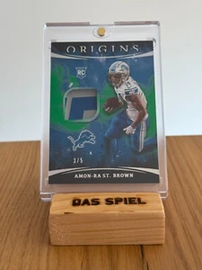 2021 Amon-Ra St. Brown Origins 3/5 Auto RC Rookie Two Color Patch Detroit Lions - Bild 1 von 2