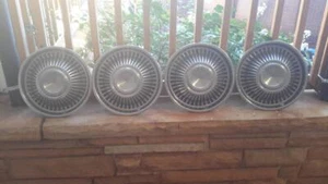 FOUR VINTAGE PONTIAC DOG DISH HUBCAPS - Picture 1 of 13