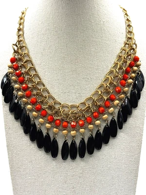Collar babero estilo cota de malla tono dorado doble cuentas negro y madera naranja Foto 1 de 4