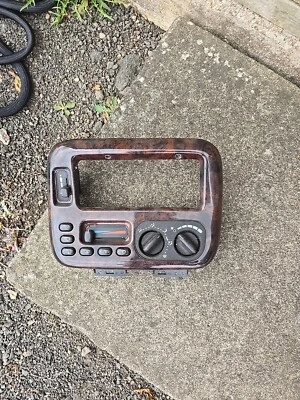 Chrysler Caravan 04677966AB Climate Control Unit with Bezel P4677966 Wood grain - Image 1 of 2