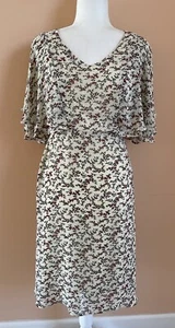 Vestido de polietileno estampado floral sin mangas con diseño de capa S - Imagen 1 de 8