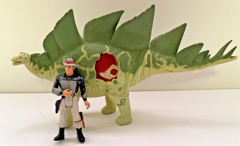 Figura Turner 1993 Jurassic Park Battle Damage Stegosaurus JP07 y sargento T-Rex leer Foto 1 de 4