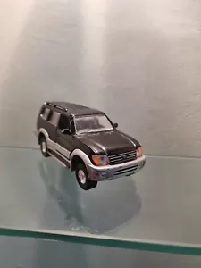 Lattine Giocattoli 1:35 TOYOTA LAND CRUISER Diecast T627 - Foto 1 di 7