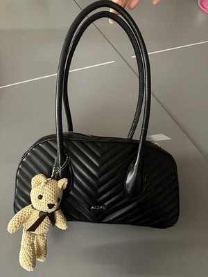 Auténtico bolso de hombro Aldo mediano con asa superior con dije de oso Foto 1 de 4