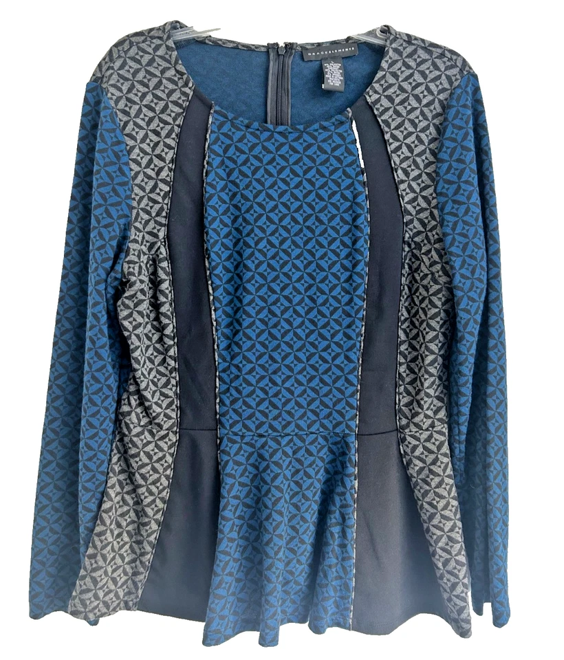 Top geométrico arte para usar peplum geométrico grandes elementos de gracia azul precio de venta sugerido por el fabricante 68 USD Foto 1 de 4