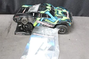 TRAXXAS 68386-4 SLASH 4WD BRUSHLESS VXL 3S SCT 228 - Foto 1 di 3