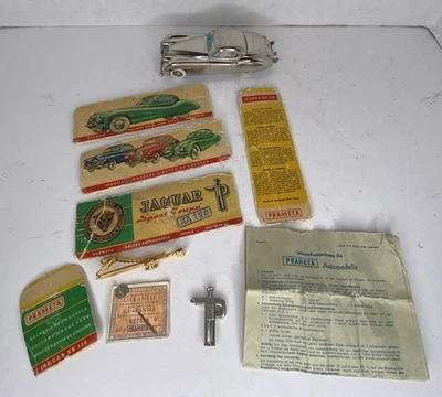 Coche de juguete vintage Prameta Jaguar XK 120 deportivo cupé cuerda Foto 1 de 4