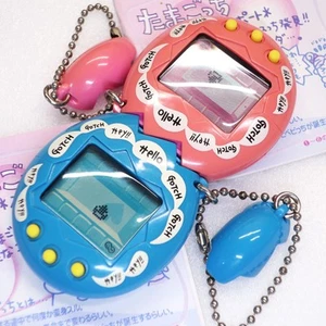 Tamagotchi Mesutchi Osutchi Blue Pink Pair w/ Manual G1 1997 Bandai Virtual Pet - Picture 1 of 12