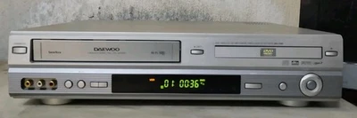 DAEWOO COMBO LETTORE DVD/VHS 6 TESTINE STEREO CON TELECOMANDO  - Immagine 1 di 4