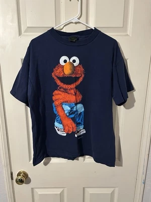 Camiseta Elmo Vintage Jim Henson Sesame Street Fabricada nos EUA Anos 90 - Imagem 1 de 4