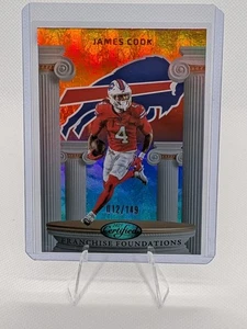 Fundaciones de franquicia James Cook 2025 con certificación Panini #/149 espejo naranja Prizm - Imagen 1 de 3