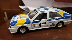 BURAGO BBURAGO 1/24 AUDI QUATTRO RALLY #4 SANYO VINTAGE - Foto 1 di 7