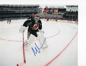 NEW JERSEY DEVILS MARTIN BRODEUR SIGNED OUTDOOR GAME 8X10 - Picture 1 of 1