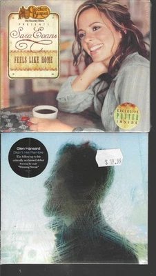 Sara Evans, Glen Hansard, Celine Dion, Tony Bennett, The Elms, The Lion King CDs Foto 1 de 4