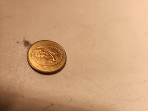VINTAGE HOLLAND AMERICA CRUISE LINE 25 Cent CASINO GAMING TOKEN - Picture 1 of 3