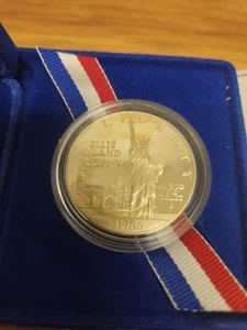 UNITED STATES 1986 S ELLIS ISLAND ONE DOLLAR (PSL037292) - Picture 1 of 3
