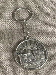 Singapore Sentosa Keychain Round Vintage 1 1/2" Metal Silver Color - Picture 1 of 7