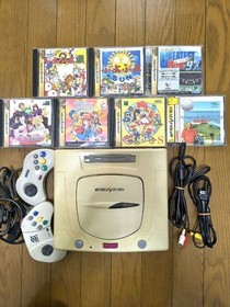 Sega Saturn body with 2 controllers and 7 game software