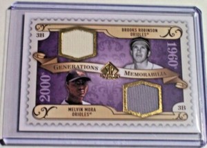 09 SP Legendary Cuts Generations Dual Jersey Melvin Mora Brooks Robinson Damaged