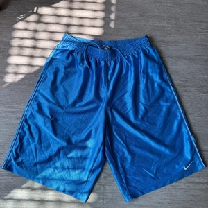 Vintage Nike Basketball Shorts Mens XL Carolina Blue Shiny Silky Baggy Y2K 90s - Picture 1 of 8