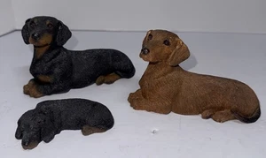 3-Sandicast Sandra Brue - Dackel rot & schwarz Erwachsene schlafen Baby realistisch - Bild 1 von 21