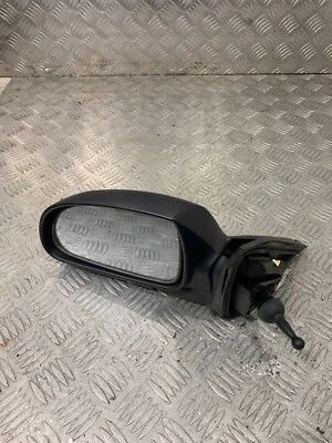 Espejo retrovisor Hyundai Accent 2005 lado del pasajero negro 012129 #2 Foto 1 de 4