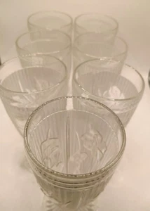 Juego de siete vasos Jeanette "Iris & Herringbone" 1928-1932 transparentes 65/8" 12 oz. - Imagen 1 de 4