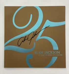 ALAN JACKSON SIGNED AUTOGRAPH 25 YEARS OF KEEPIN IT COUNTRY PHOTO BOOK RARE! JSA - Picture 1 of 2