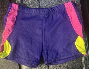 Pantaloncini corti bambina 7/8 stile libero viola/verde lime/rosa - Foto 1 di 3