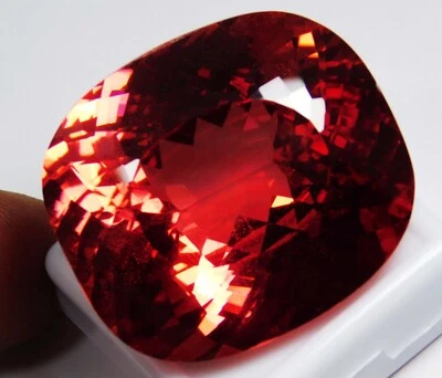 CERTIFICADO PREMIUM CALIDAD ZAFIRO NATURAL ROJO ANARANJADO 122,30 Ct FORMA COJÍN Foto 1 de 4